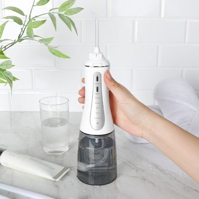 Rechargeable Portable Cordless Water Flosser With Rotatable Nozzle